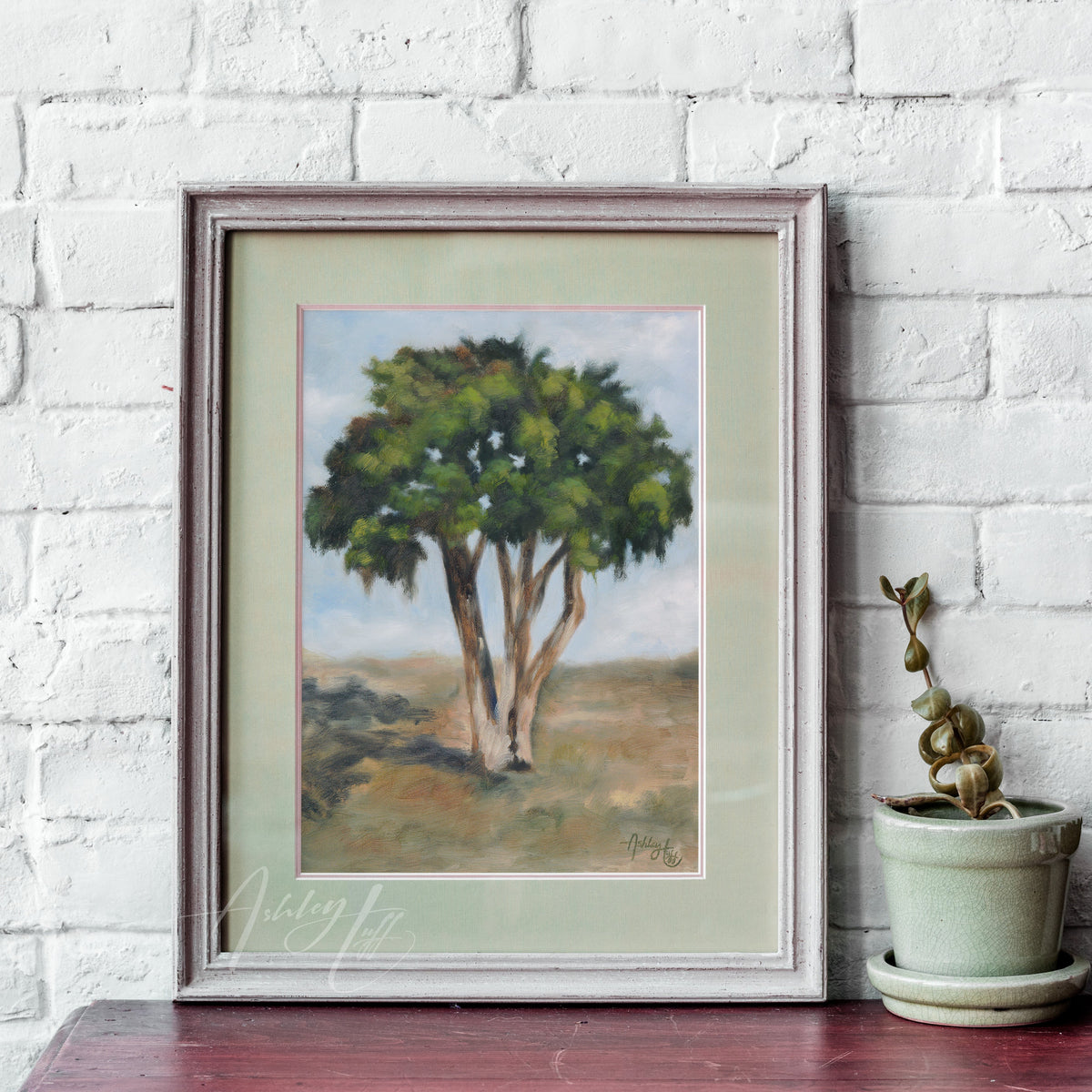 original hand-painted solitary tree in green, blue, and brown. Impressionistic and soft romantic brushstrokes