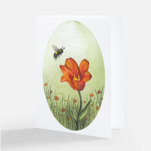 A white greeting card standing upright, featuring an oval illustration of a bright red tulip with green stems, small red flowers, and a bee on a pale green background.